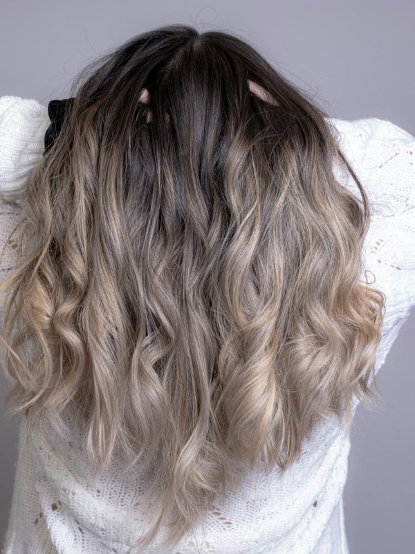 Blonde hair with hand-painted highlights